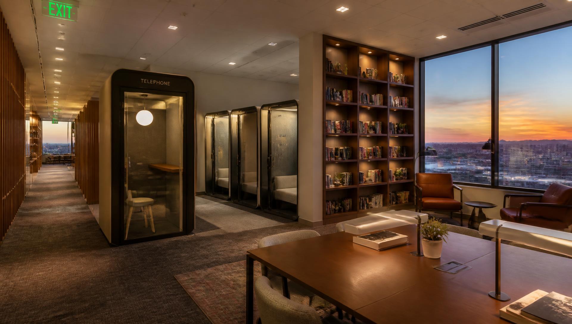 Focus zone · phone booths, pods and a library quiet room at sunset